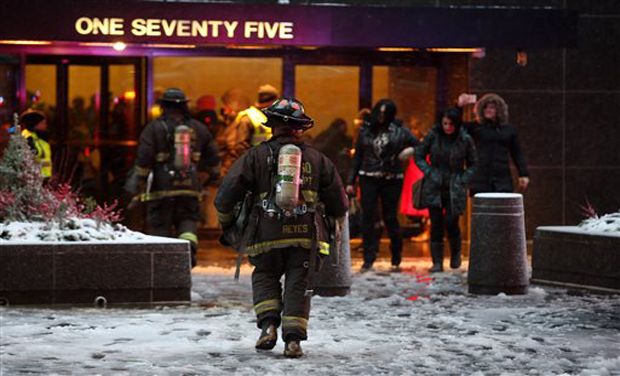 Authorities respond to a fire at the John Hancock Center in Chicago (Photo: AP) Authorities respond to a fire at the John Hancock Center in Chicago (Photo: AP)